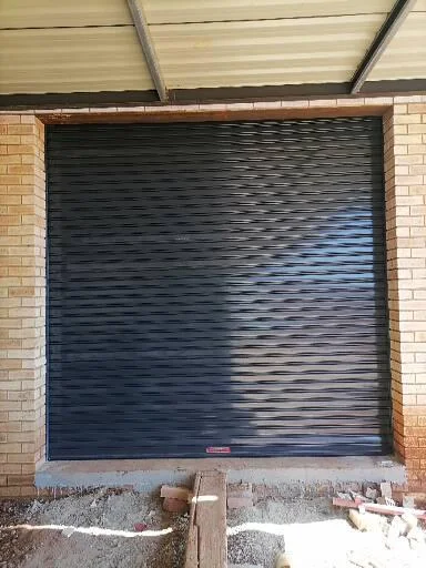 White expandable gate fitted across kitchen window
